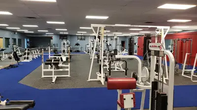 a gym with a lot of tread machines at Travelodge by Wyndham Simcoe in Simcoe