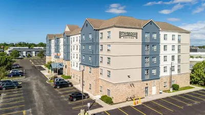 an aerial view of a building with a parking lot at Staybridge Suites London by IHG in London