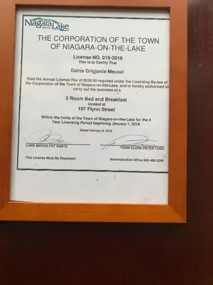 a framed picture of the documentation of the town of macarapa on the lake at Cedar Gables Bed & Breakfast in Niagara on the Lake
