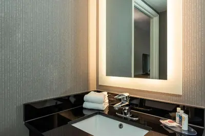 a bathroom with a sink and a mirror at Comfort Inn in Cambridge