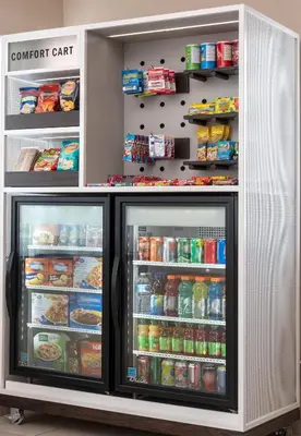 a refrigerator filled with lots of food and drinks at Comfort Inn in Cambridge