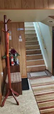 a stairway in a room with a stair case at Private Apartment Close to Airport Toronto Pearson in Toronto