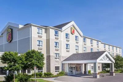 a rendering of a hotel building with a gazebo at Super 8 by Wyndham Peterborough in Peterborough