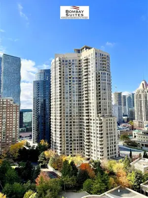 a view of a large city with tall buildings at Bombay Suites Mississauga in Mississauga