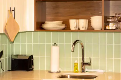 a kitchen counter with a sink and a microwave at Staybridge Suites - Waterloo - St. Jacobs Area in Waterloo