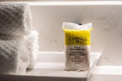 a container of food sitting on a shelf next to a towel at Staybridge Suites - Waterloo - St. Jacobs Area in Waterloo