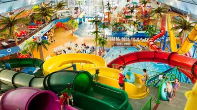 a large indoor water park with a water slide at Clifton Victoria Inn at the Falls in Niagara Falls