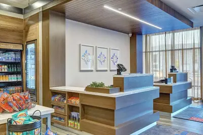 a grocery store with a checkout counter in a store at Hilton Garden Inn Toronto/Brampton West, Ontario, Canada in Brampton