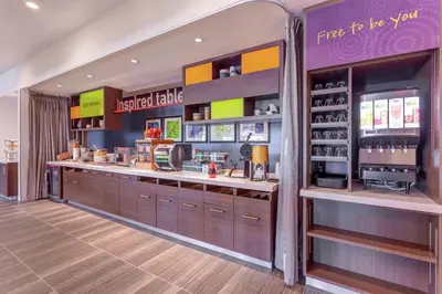 a fast food restaurant with a counter in a room at Home2 Suites By Hilton Toronto/Brampton, On in Brampton