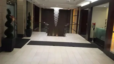a bathroom with a urinal in a building at SPECTACULAR VIEW, 2 BEDROOMS FURNISHED CONDO and BEST LOCATION in Mississauga