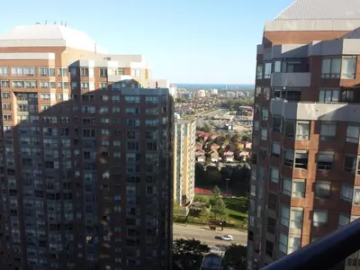 a view of some tall buildings in a city at SPECTACULAR VIEW, 2 BEDROOMS FURNISHED CONDO and BEST LOCATION in Mississauga