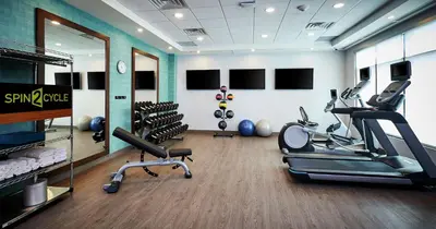 a gym with treadmills and cardio equipment in a room at Home2 Suites By Hilton Brantford in Brantford