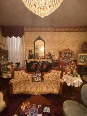 a living room with a couch and christmas decorations at Pemberley House Bed and Breakfast in Seaforth