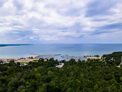 an aerial view of a resort near the water at GlobalStay Modern House near Huron Lake Port Elgin in Port Elgin