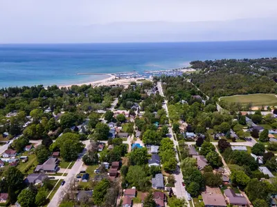 an aerial view of a town with the beach at GlobalStay Modern House near Huron Lake Port Elgin in Port Elgin
