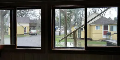 a view of a house from a window at Sunrise Resort in Buckhorn
