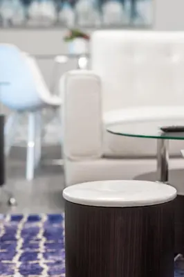 a table and chairs and a stool in a room at ENTIRE 2 BEDROOM APARTMENT UPTOWN WATERLOO - e3 in Waterloo