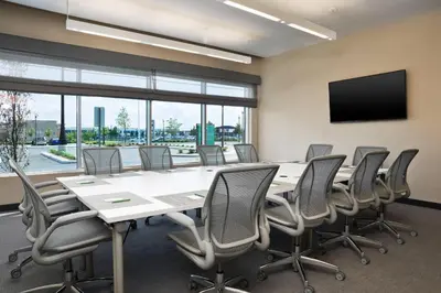 a conference room with a large table and chairs at Element Vaughan Southwest in Vaughan