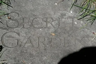 a writing on a rock with the words broken glassaria at Burley's Executive Garden Suite in Peterborough