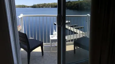 a view of a balcony with a view of the water at Muskoka Lakes Hotel and Resorts in Port Carling