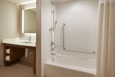 a bathroom with a shower and a sink at Residence Inn by Marriott Toronto Mississauga Southwest in Mississauga