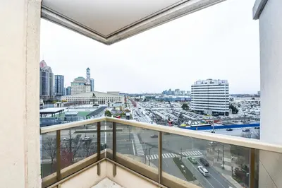 a balcony with a view of a city at PlanURstay - Luxury 1BR Condo with City View in Mississauga