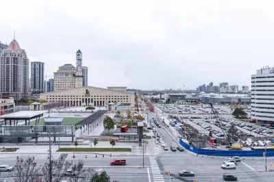 a city with a lot of traffic in a parking lot at PlanURstay - Luxury 1BR Condo with City View in Mississauga