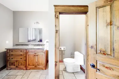 a bathroom with a toilet and a sink at Lucille 109 in Blue Mountains