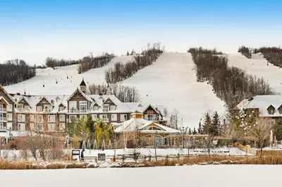 a resort in the snow with a ski slope at Condo 710 at North Creek Resort in Blue Mountains