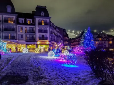a city with christmas lights and a christmas tree at Wintergreen 218 in Blue Mountains