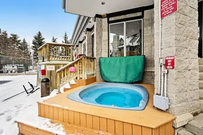 a jacuzzi tub in the middle of a building at Condo 616 at North Creek Resort in Blue Mountains