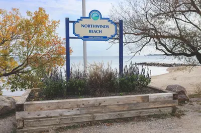 a sign for a northumsack beach on the beach at Condo 616 at North Creek Resort in Blue Mountains