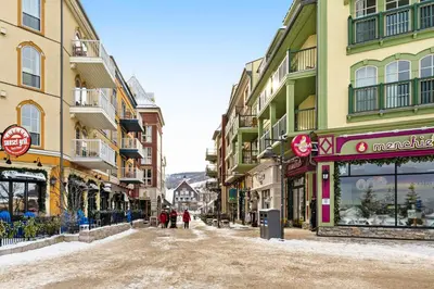 an empty street in a city with buildings at Wintergreen 202 in Blue Mountains