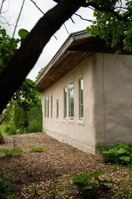 a building with windows on the side of it at Owl's Nest Suites in Carrying Place