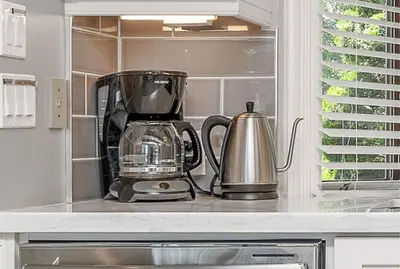 a kitchen counter with a blender and a tea kettle at Kawartha Lakes, Fenelon Falls in Fenelon Falls