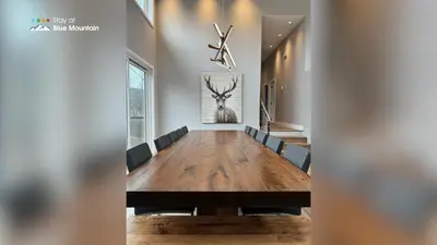 a conference room with a wooden table and chairs at Orchard Run Chalet in Blue Mountains