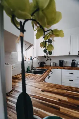 a yellow flower in the middle of a kitchen at Boho Cottage - Hot tub and close to Beach in Fort Erie