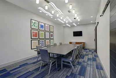 a conference room with a table and chairs at Holiday Inn Express & Suites - Port Elgin in Port Elgin