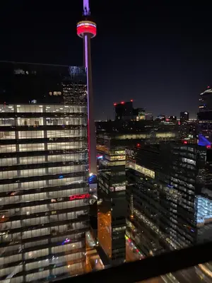 a view of the space needle at night at Toronto CN Tower Maple Leaf Square Luxurious 2 Bedroom Condo in Toronto