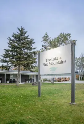 a sign that reads the lake at blue mountains at 2BR Boutique Suite #8 in Blue Mountains