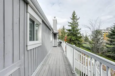 a wooden walkway leading up to a house at Cozy Collingwood Retreat 80204 in Collingwood