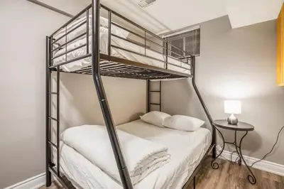 a bedroom with a bunk bed in a room at Luxurious Private House Pool and Hot Tub in Blue Mountains