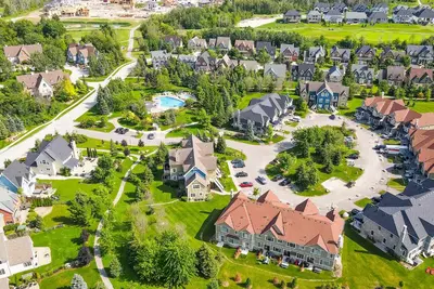 an aerial view of a residential neighborhood with houses at Blue Mountain 3 bedroom Dream Chalet 81590 in Collingwood