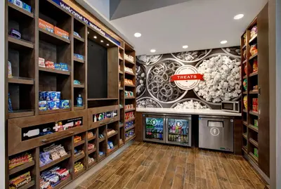 a grocery store aisle with food and drinks at Hampton Inn & Suites By Hilton Waterloo St. Jacobs in Waterloo