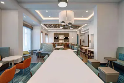 a large conference room with a large table and chairs at Hampton Inn & Suites By Hilton Waterloo St. Jacobs in Waterloo