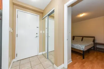 a room with a door leading to a bedroom at PlanURstay - Amazing 2BR & 2BTH - Near Square One Mall in Mississauga