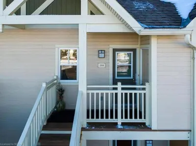 a front porch of a house with a white railing at Great Location, Pool, Blue Mountain 2 BDRM Dream in Blue Mountains