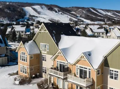 an aerial view of a house with snow on the roof at Great Location, Pool, Blue Mountain 2 BDRM Dream in Blue Mountains