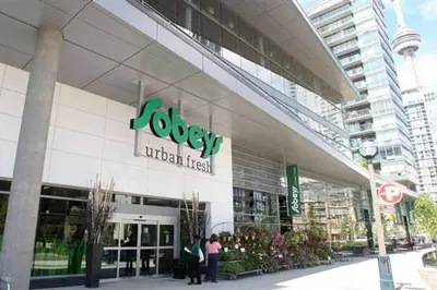 people standing outside of a hospital building at Elegant Downtown Condo Near CN Tower -FREE Parking in Toronto
