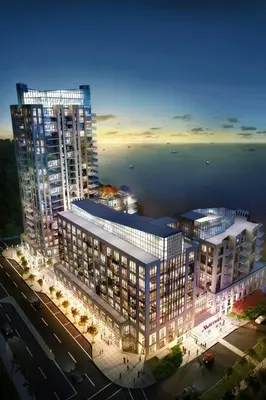 a rendering of a large building with lights at The Pearle Hotel & Spa, Autograph Collection in Burlington